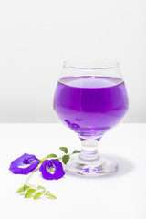 Butterfly pea flower juice in wine glass