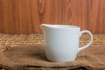 Cow milk and ceramic jug