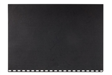 Black embossed cardboard sheet torn from a notebook, isolated on
