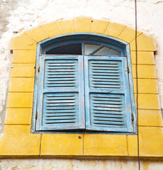  window in morocco africa yellow  brick historical