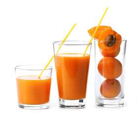 Glasses of apricots juice isolated on white