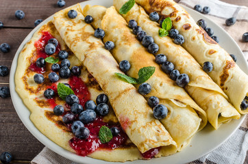 Pancakes with jam and blueberries