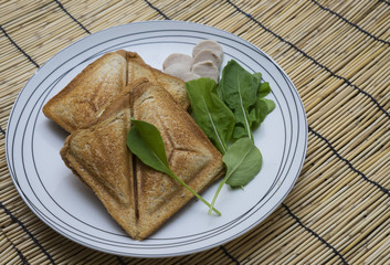 sanwiches is dish on bamboo