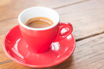 Hot coffee cup on wooden table