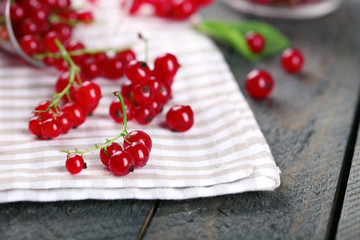 Fresh red currants on table close up