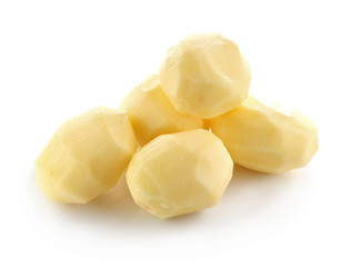 Raw peeled potatoes isolated on white