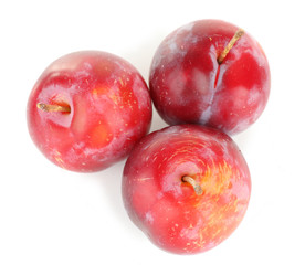 Ripe plums isolated on white
