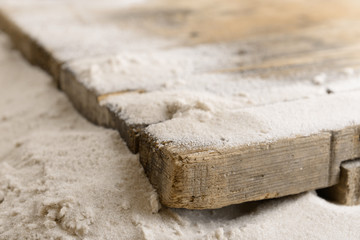 Sand with wooden planks, closeup