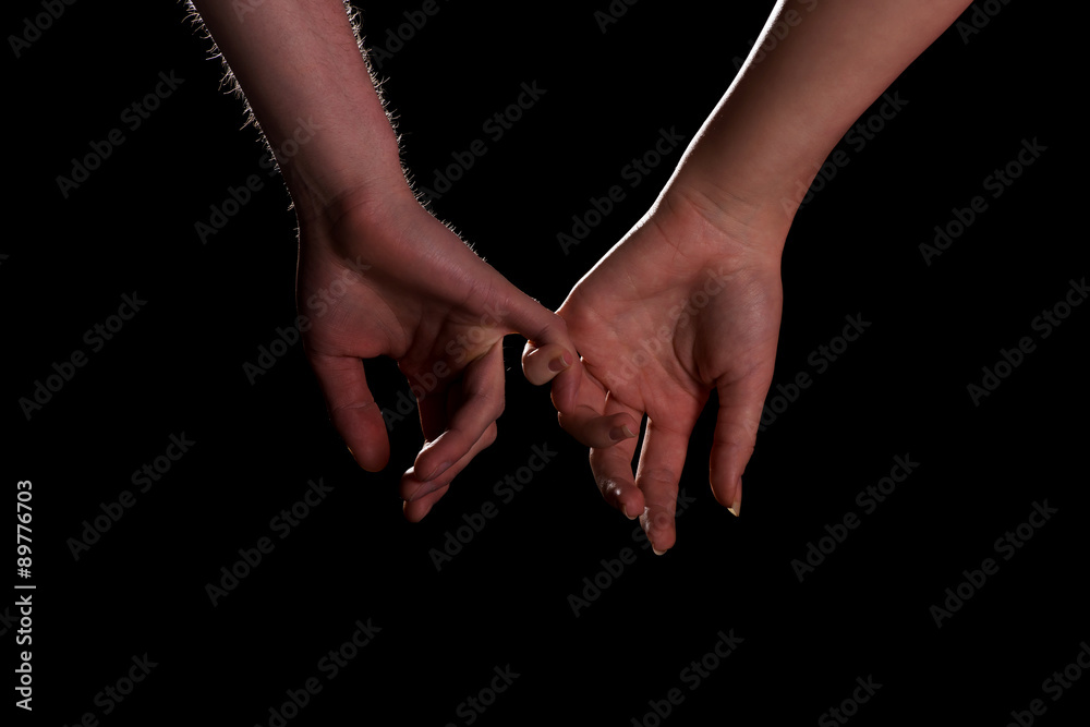 Wall mural female and male hands together.