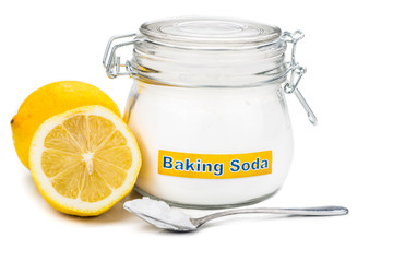 Spoonful of baking soda and lemon fruits for multiple holistic u