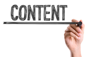 Hand with marker writing the word Content