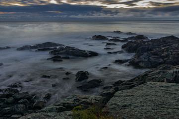Fototapeta na wymiar Waves Crashing on the Maine Coast