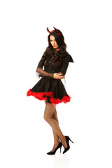 Devil woman standing in nervous pose 