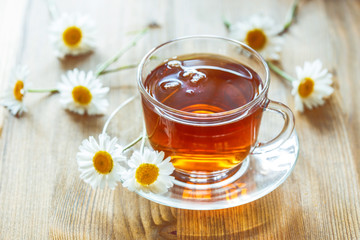 Cup of tea with chamomile