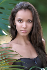 Naklejka premium portrait of a beautiful young girl in a swimsuit