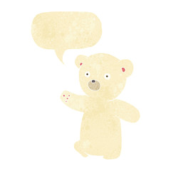 cartoon polar bear cub with speech bubble