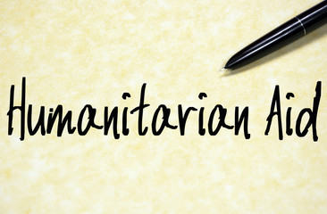 humanitarian aid text write on paper
