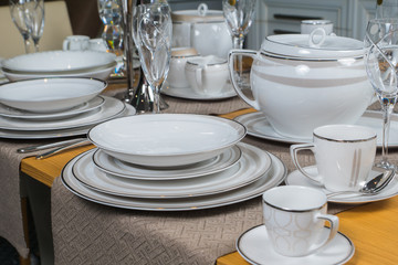white luxury ceramic dinner service on wooden table 3