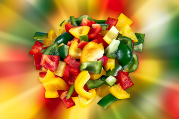 Fresh vegetables Three sweet Red, Yellow, Green mix sliced Peppers on colorful background