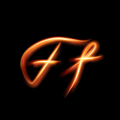 Glowing light letter F. Hand lighting painting