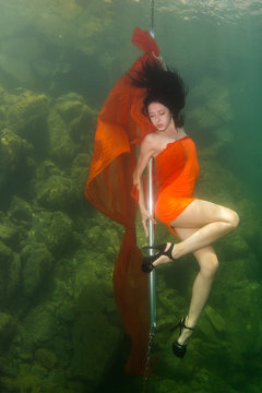 Underwater striptease