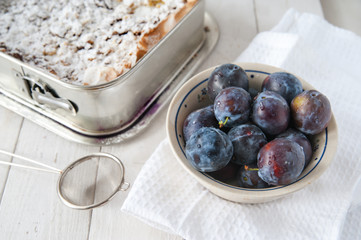 Preparing plums for cake