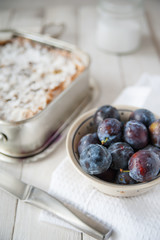 Preparing plums for cake