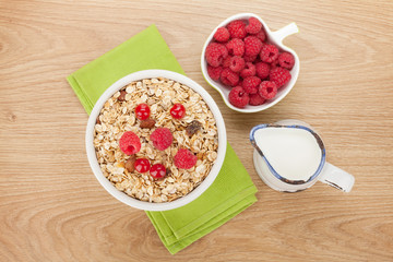 Healty breakfast with muesli, berries and milk