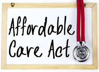 affordable care act text write on blackboard