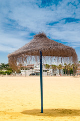 Reed umbrellas on the beach