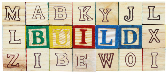 Word "BUILD" from alphabet wooden blocks