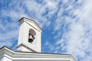Small bell tower with a bell of a country church 