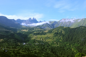 Looking at clouds floating in front of  les aiguilles d'arves from Col du Mollard, in the summer time