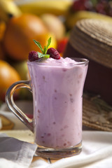 Raspberry smoothie in a glass.