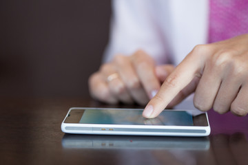 touch screen, close-up,  small depth of field, soft focus