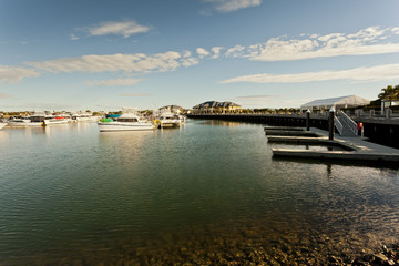Fototapeta premium Boats docked along the shore