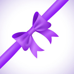 Big shiny purple bow and ribbon on white background. 