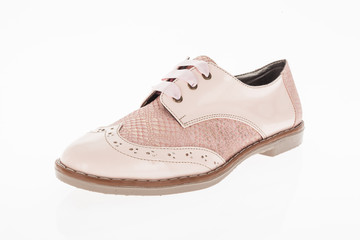  shoe made of pink leather with laces for women on white background