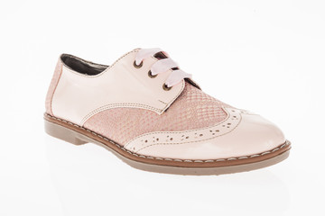  shoe made of pink leather with laces for women on white background