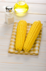 sweet corn  on a wooden table