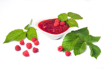 Raspberries jam with berries and leavies