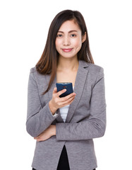 Fototapeta premium Asian young businesswoman use of the mobile phone
