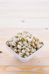 Pistachio nuts in a bowl
