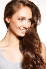 Fototapeta premium Young woman with a beautiful hair