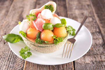 salad with melon,mozzarella and basil