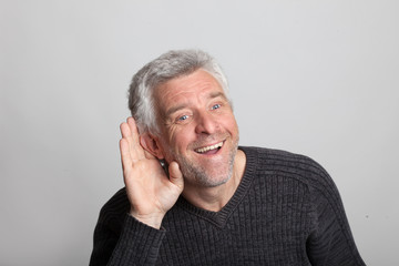 deaf  older gray-haired man