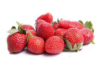 Strawberries are an excellent source of vitamin and one of the know antioxidant fruit.
Here group of strawberry arrange and photographed against white background