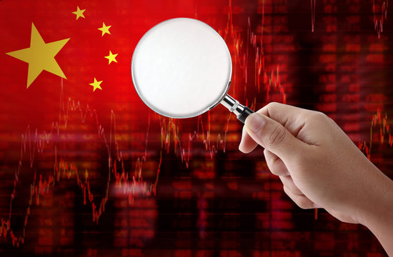 Flag of China. Downtrend stock data diagram holding magnifying - Powered by Adobe
