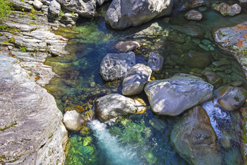 Fototapeta na wymiar Maggia river flowing
