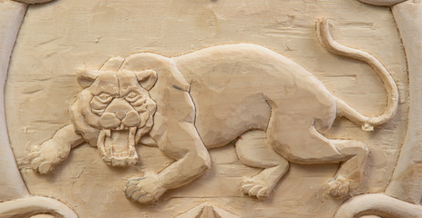 tiger carved out of wood